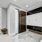 custom-homes-toronto-luxury-hallway-with-custom-front-door-and-build-in-cabinets