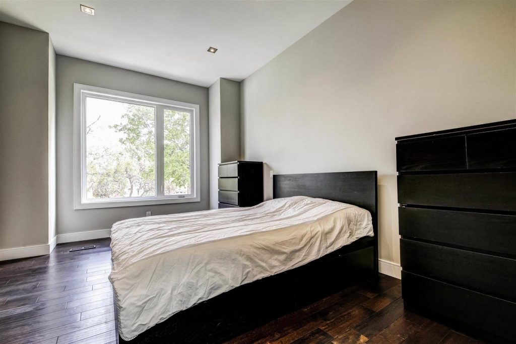 custom-master-bedroom-with-potlights-and-dark-wood-floor-home-renovation-contractors-toronto