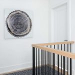 custom staircase with wooden railings - interior designers