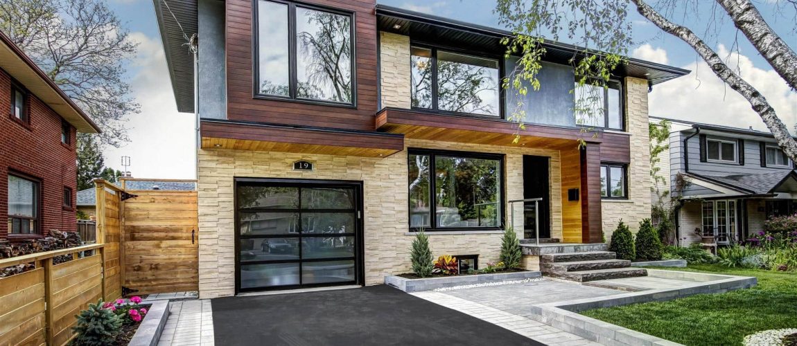 Modern Home with Stone Siding and Wooden Exterior Trim - Home Renovations Toronto