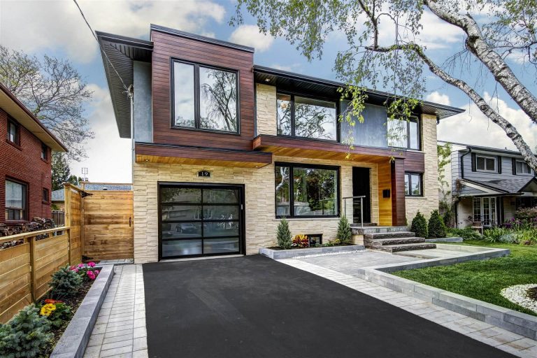 Modern Home with Stone Siding and Wooden Exterior Trim - Home Renovations Toronto