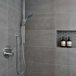 modern walk in shower with build in storage space - home builders toronto