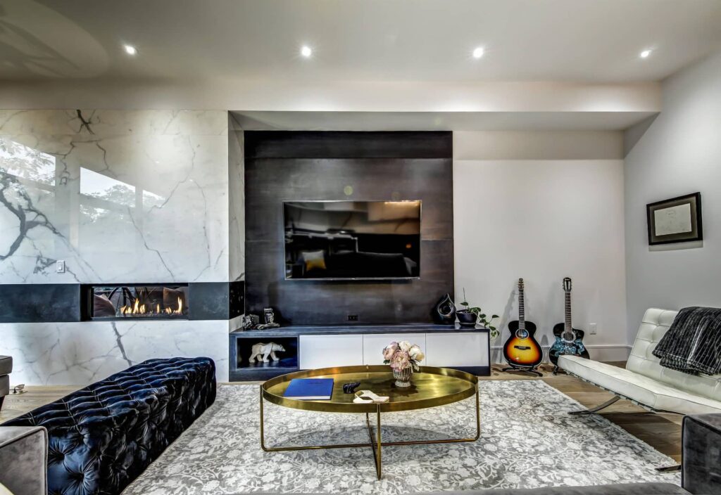 Amazing Family Room with Marble Wall Decor and Build in Fireplace - Home Remodeling oakville