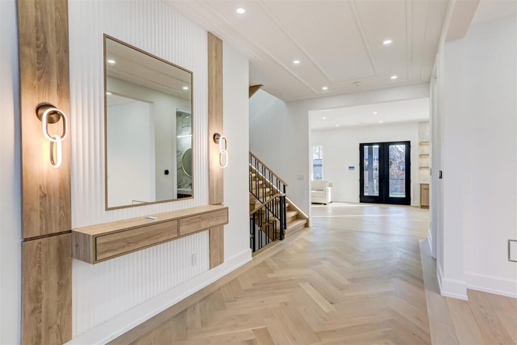 Bright Saybrook custom home foyer
