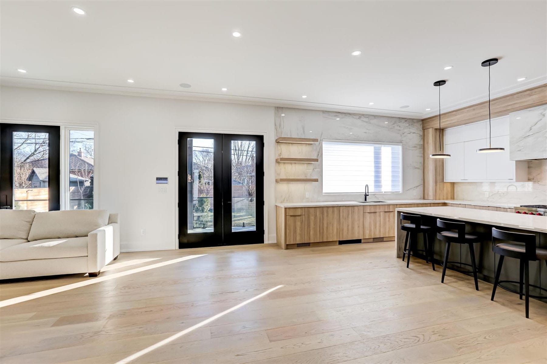 Custom kitchen with detailed millwork by NICK’S Developments